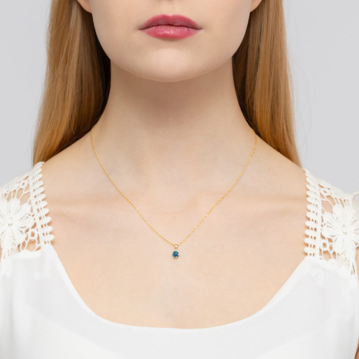 Złota zawieszka topaz London Blue Z076